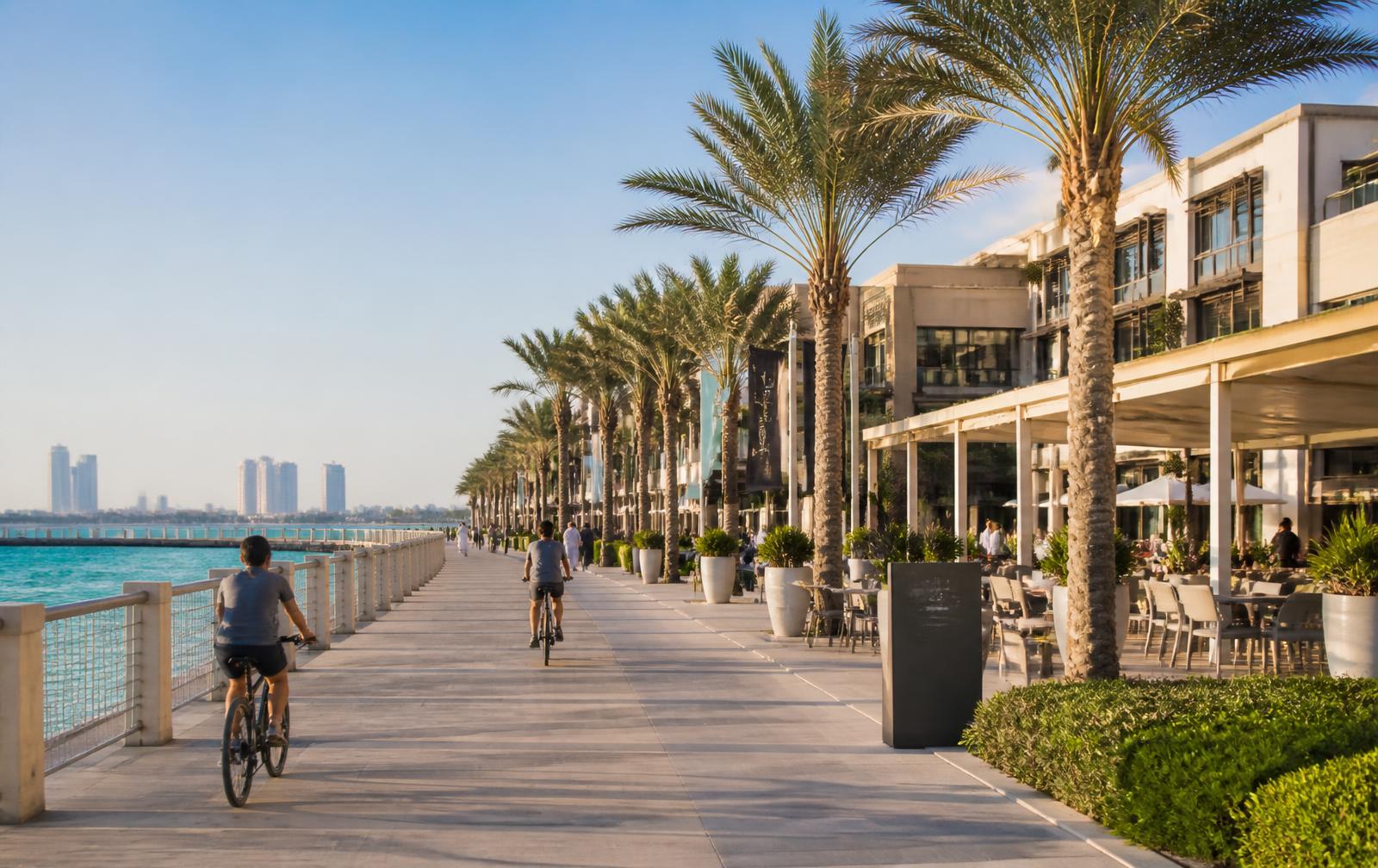 Landscaped parks and waterfront promenade at Marsa Al Saadiyat
